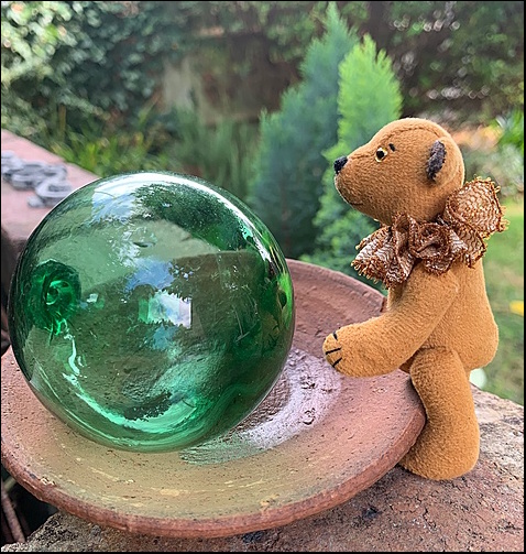 Isabella with a glass ball