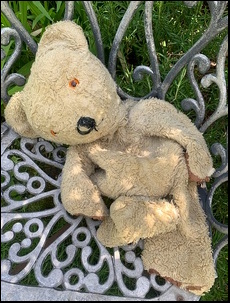 Sarah R.'s Pooh Bear before treatment