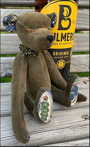 Gregory sitting by the bottle of cider