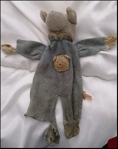 Heather S.'s Soother Bear before treatment