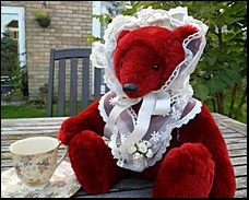 Margaret drinking tea in the garden