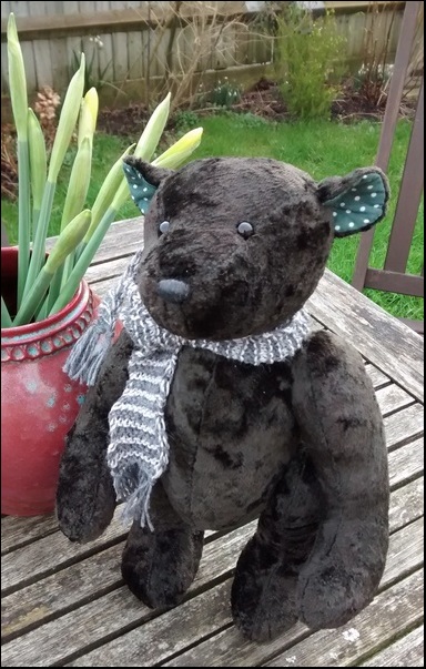 Paul on the garden table with flowers